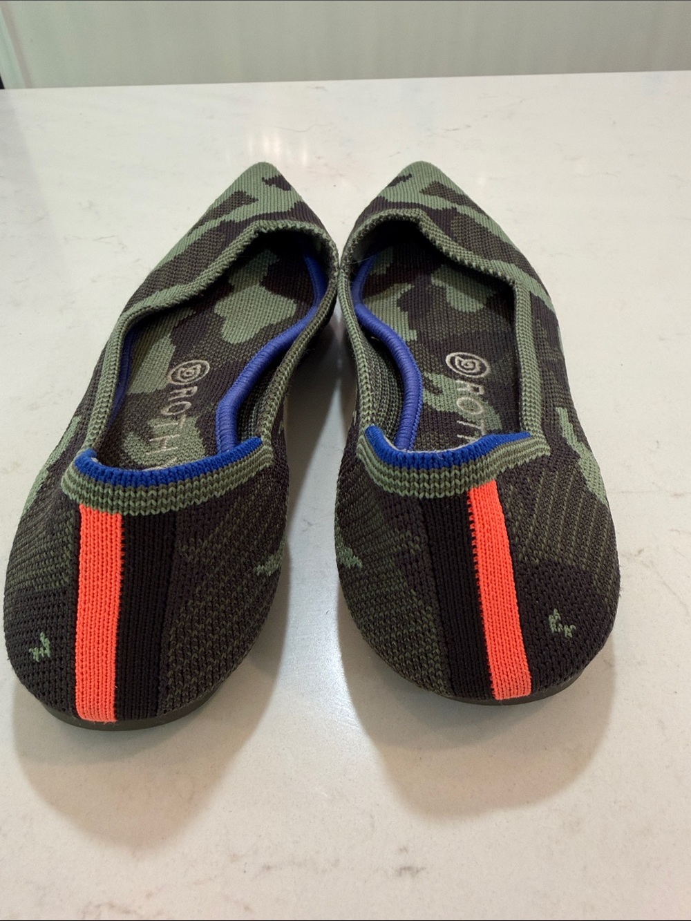 Rothy's Kids Green Camouflage Slip-On Flats with Neon Orange Stripe